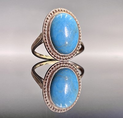 Lot 129 - A 9ct gold turquoise set ring, the oval...