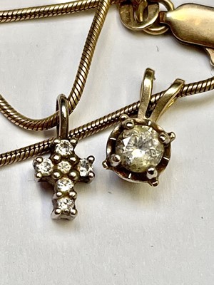 Lot 124 - A diamond set pendant, 0.20ct, together with a...