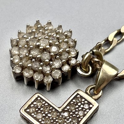 Lot 128 - A 9ct white gold diamond cluster pendant,...