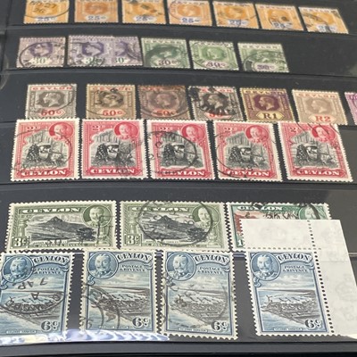 Lot 389 - Cameroon to Estonia. Two stock books...