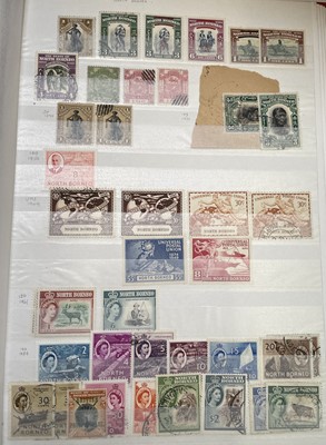 Lot 394 - Labuan to New Zealand. Three stockbooks from...