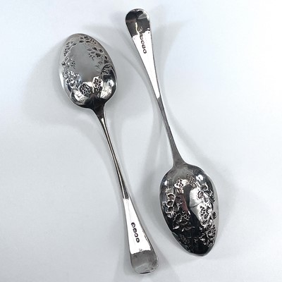 Lot 51 - A pair of George III silver berry spoons by...