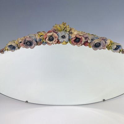Lot 52 - A Barbola oval wall mirror, with floral...