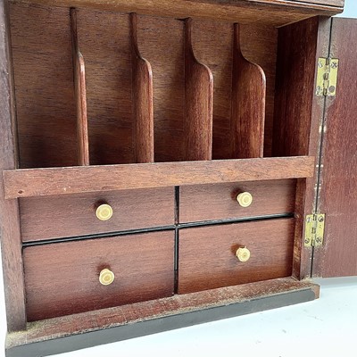 Lot 10 - A 19th century home apothecary cabinet, with...