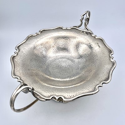Lot 72 - An Edwardian silver Arts & Crafts twin handled...