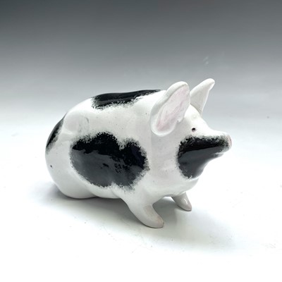 Lot 812 - A Wemyss pig, with black and white sponged...