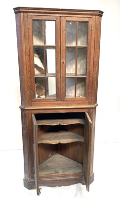 Lot 90 - A 19th century carved oak standing corner...