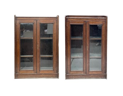 Lot 3025 - A pair of glazed oak bookcases, early 20th...