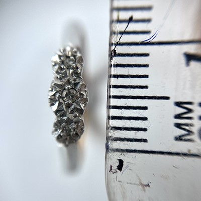 Lot 12 - An 18ct gold and platinum illusion set chip...