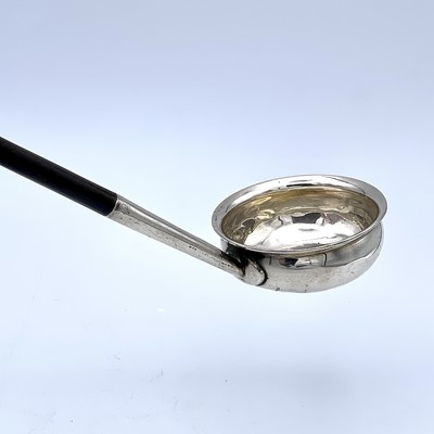 Lot 26 - A Georgian silver punch ladle with baleen...