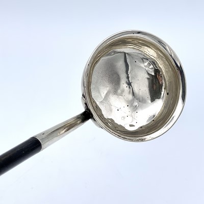 Lot 26 - A Georgian silver punch ladle with baleen...