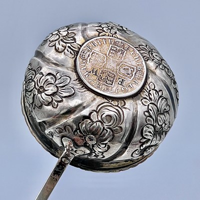 Lot 161 - A Georgian silver punch ladle with baleen...