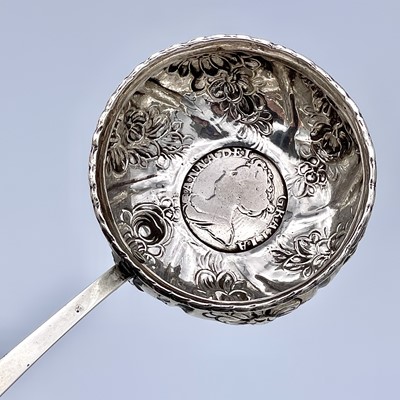 Lot 161 - A Georgian silver punch ladle with baleen...