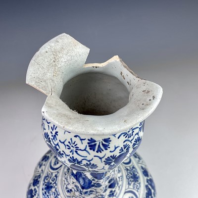 Lot 25 - A Dutch Delft pottery vase, 18th century,...