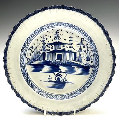 Lot 28 - Four pearlware blue and white plates, late...