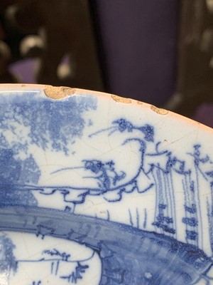 Lot 35 - An English Delft blue and white plate, late...