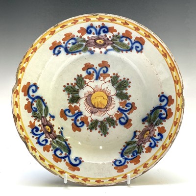 Lot 36 - A Delft polychrome dish, 18th century, with...