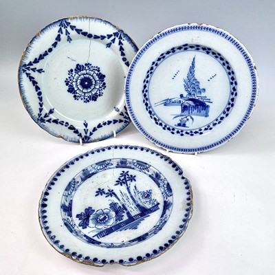 Lot 41 - Three English Delft blue and white plates,...