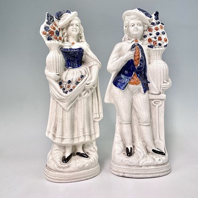 Lot 883 - A pair of Victorian Staffordshire flatback...