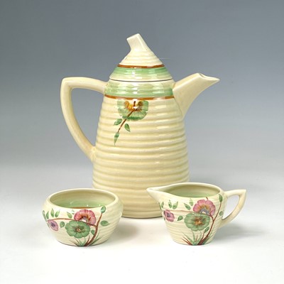 Lot 821 - A Clarice Cliff Lynton shape coffee set, circa...