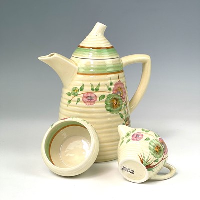 Lot 821 - A Clarice Cliff Lynton shape coffee set, circa...