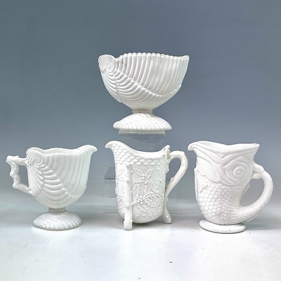 Lot 892 - A W.H.Heppel white milk glass jug, moulded as...
