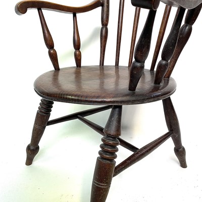 Lot 204 - A 19th century elm and beech kitchen armchair,...