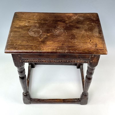 Lot 104 - A 17th century style oak joint stool, height...