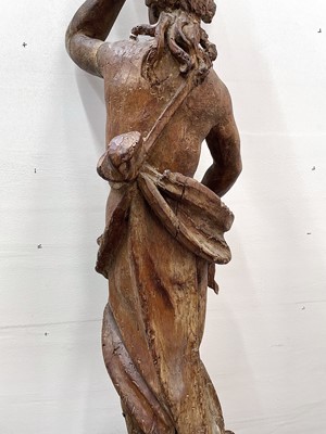 Lot 106 - A 17th century carved wood figure of female...