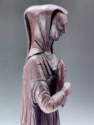Lot 108 - A carved oak figure of Saint Barbara, Northern...