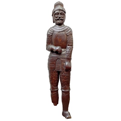 Lot 110 - A carved oak figure of a knight, height 125cm,...