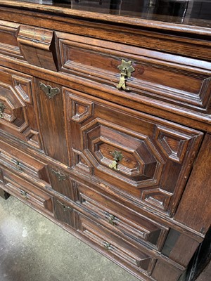 Lot 119 - A 17th century oak chest of drawers, in two...