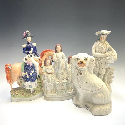 Lot 128 - Four Victorian Staffordshire figures, to...
