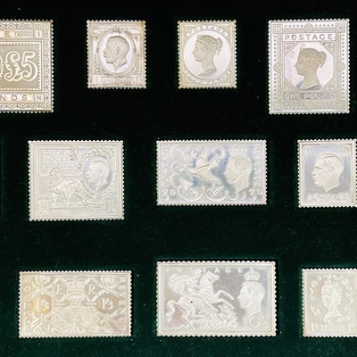 Lot 162 - A 1977 cased set of 25 silver British postage...