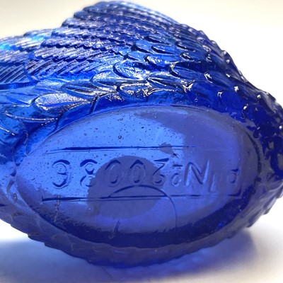 Lot 911 - Two Burtles, Tate & Co blue glass swan salts,...