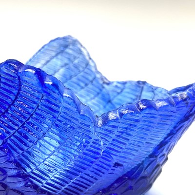 Lot 911 - Two Burtles, Tate & Co blue glass swan salts,...