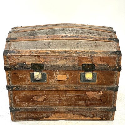 Lot 72 - A Victorian leather covered domed top trunk,...