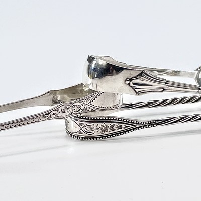Lot 185 - A pair of Victorian silver sugar nips with...
