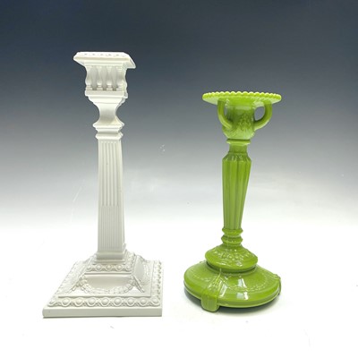 Lot 925 - A Sowerby glass aesthetic green candle holder...