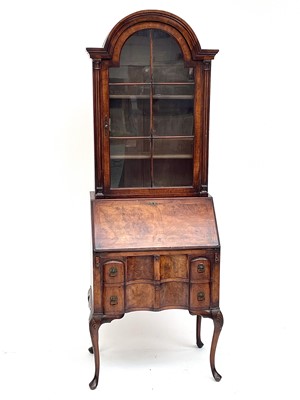 Lot 3035 - A Queen Anne style walnut bureau bookcase,...