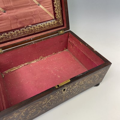 Lot 14 - A Regency rosewood and cut brass inlaid...