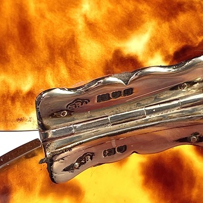 Lot 277 - An Edwardian oval tortoiseshell box, with...