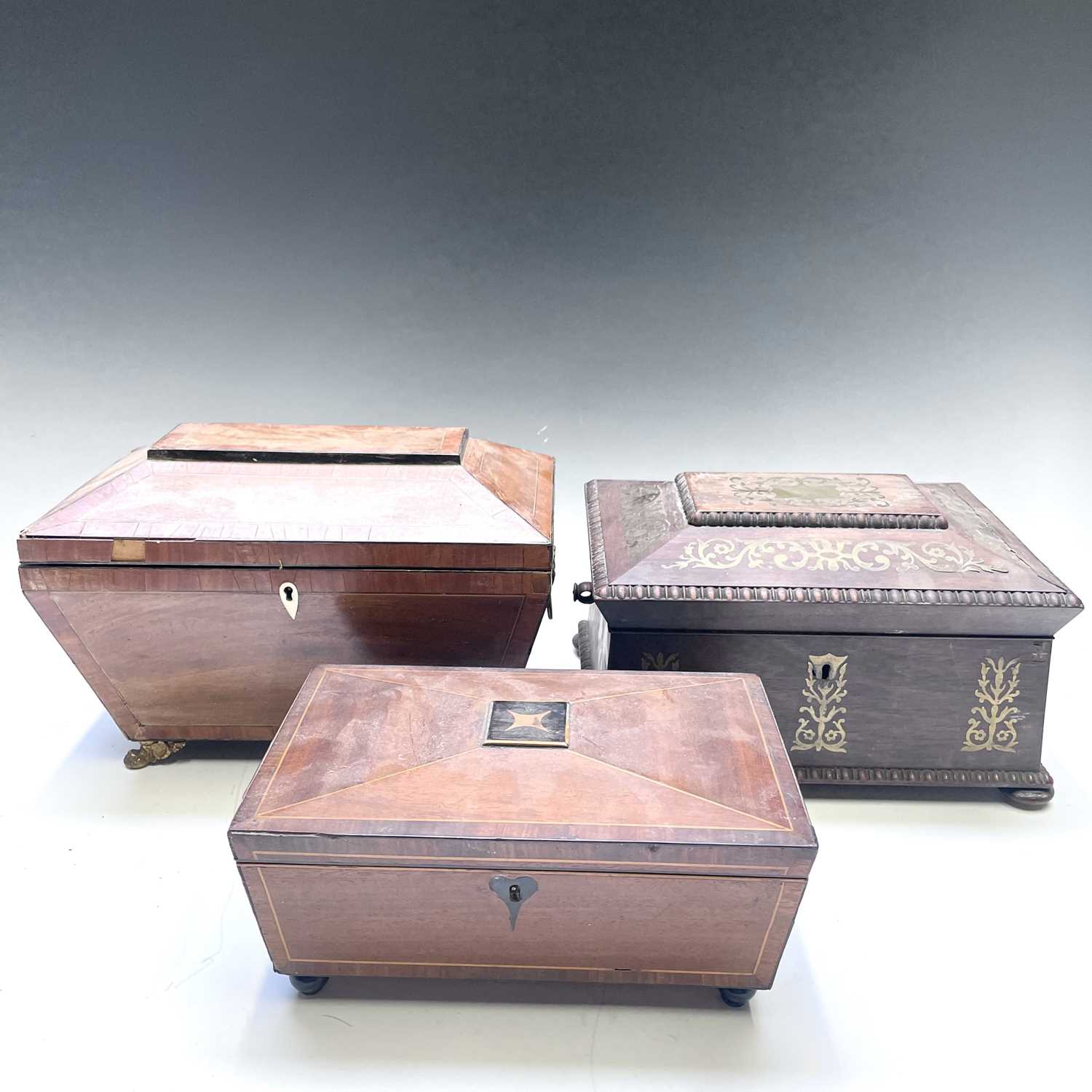 Lot 17 - A Regency rosewood and cut brass inlaid...