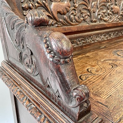 Lot 68 - A Victorian carved oak hall bench, height...