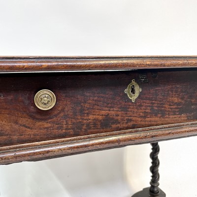 Lot 54 - A late 17th century oak side table, with a...