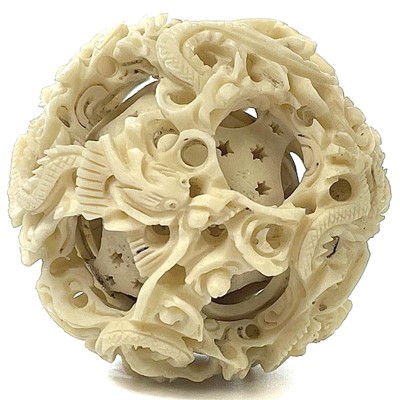 Lot 274 - A 19th century Chinese ivory concentric ball,...
