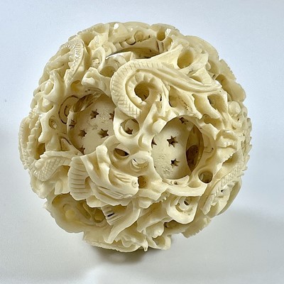 Lot 274 - A 19th century Chinese ivory concentric ball,...