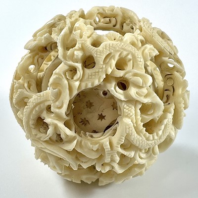 Lot 274 - A 19th century Chinese ivory concentric ball,...