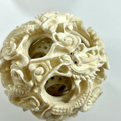 Lot 211 - A 19th century Chinese ivory concentric ball,...