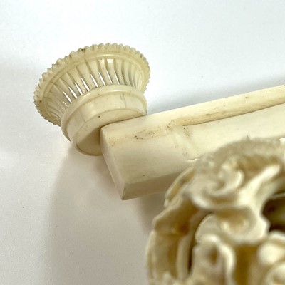 Lot 211 - A 19th century Chinese ivory concentric ball,...